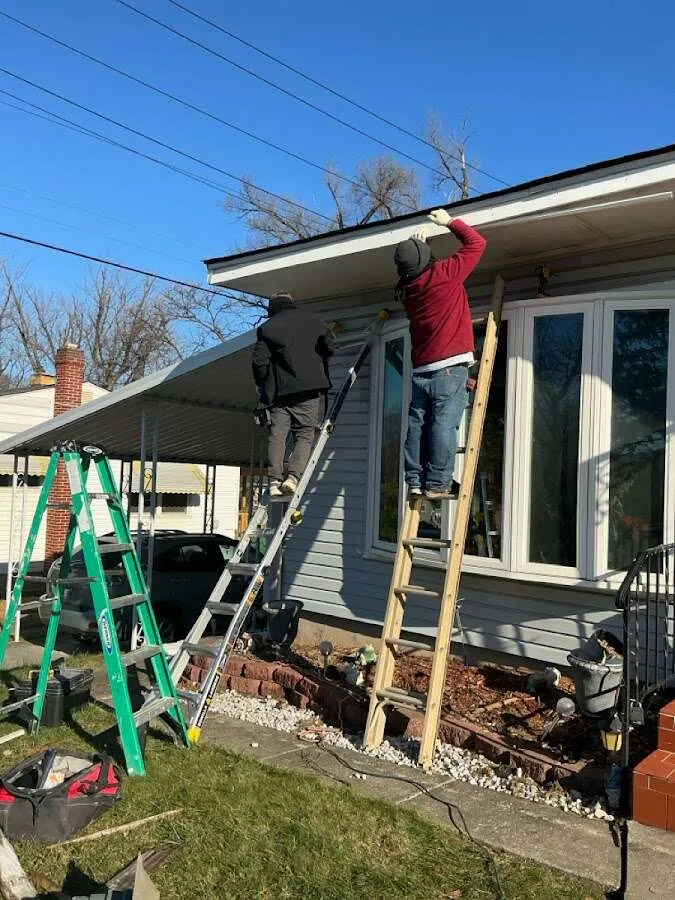 Restoration crew performing exterior repair in Windsor